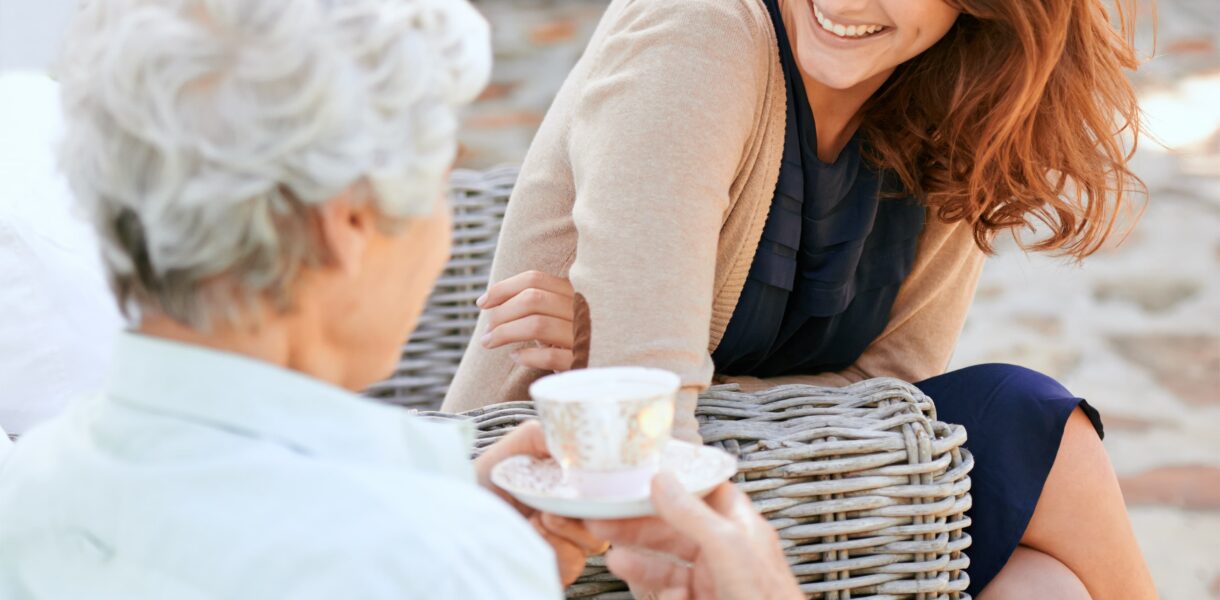 Senior and daughter talking about senior living